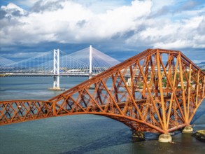 Forth Bridge from a drone, Queensferry Crossing, Forth Estuary, Scotland, United Kingdom