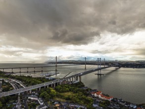 Rain clouds over Forth Road Bridge and The Queensferry Crossing from a drone, Queensferry Crossing,