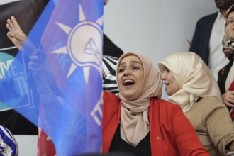 Gaziantep, Türkiye – May 28, 2023. Turkish citizens wave flags of Türkiye and the ruling Justice
