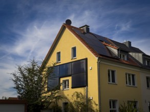 Solar panels on the roof and façade of an apartment block in Wuppertal, Germany