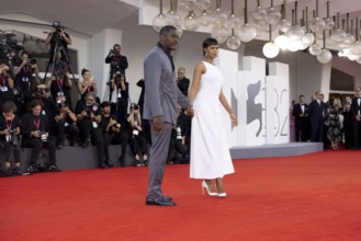 Venice, Italy - 2 September 2025: Idris Elba and Sabrina Dhowre Elba during the red carpet of - A