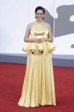 Venice, Italy - 3 September 2025: Noemie Merlant during the red carpet of - Duse - during the 82nd