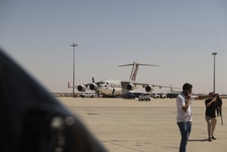 A Qatari plane carrying humanitarian and medical aid arrives at Damascus International Airport as