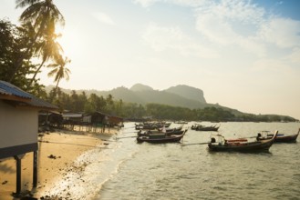 Fishing huts on the beach, sunset, Koh Mook, Trang province, southern Thailand, Andaman Sea,