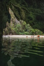 Sandy beach beach with cave in the rainforest, Emerald Cave, Koh Mook, Trang Province, Southern