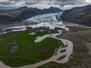 Glacier, glacier tongue, glacier lake, mountains, cloudy, aerial view, panorama, summer,