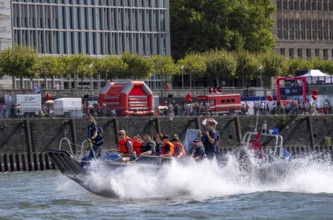 Multi-purpose boat of the THW during a training trip on the Rhine near Düsseldorf, the specialist