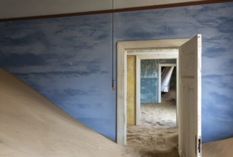 At Kolmanskop, the abandoned ghost town of the diamond days of the early 1900 and of German origin.