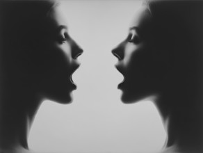 Two faces with slightly open mouths create a harmonious, calm atmosphere and a feeling of intimacy,