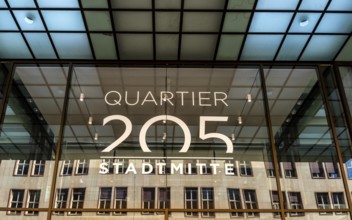 Main entrance to commercial property, partially vacant Shopping Quartier 205 on Friedrichstrasse