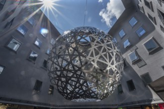 Steel sphere, Sphere, a work of art by Ólafur Eliasson, Fünf Höfe shopping arcade, Munich, Bavaria,