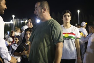 Young Kurdish woman visiting the first Damascus International Fair after Assad's fall, Damascus,