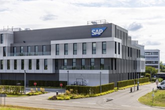 Logo and building of the software company SAP SE. Walldorf, Baden-Württemberg, Germany