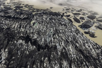 Icebergs, ice floes, glacier tongue, glacier edge, glacier, glacier lagoon, aerial view, black ice,