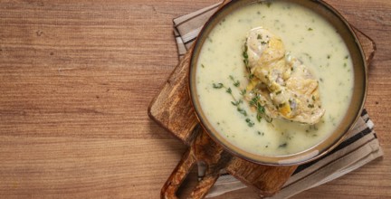 Chikhirtma chicken soup, Georgian dish, with lavash, top view, no people