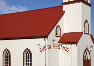 Church in Vopnafjördur with lettering on the entrance gate, East Iceland, Iceland
