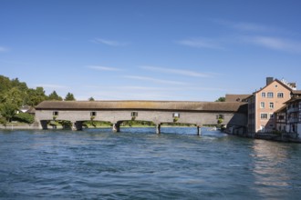 The historic wooden bridge over the Rhine was opened in 1816 and connects the German municipality