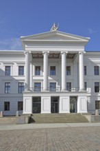 Portal with columns on the classical government building, state chancellery, college building,