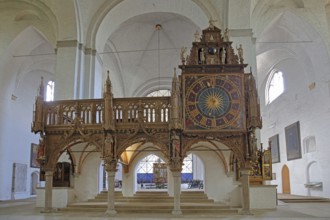 Rood screen with Gothic clock built in 1477, interior view, church clock, Lübeck Cathedral,