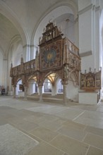 Rood screen with Gothic clock built in 1477, interior view, church clock, Lübeck Cathedral,