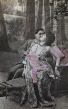 Female nude from around 1899, erotic postcard, playgirl, romantic couple in an intimate moment on a