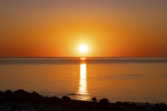 The sun rises on the Costa Rei, a stretch of coastline on the Italian Mediterranean island of