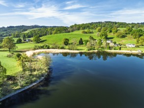 Farms over Esthwaite Water from drone, Lake District National Park, Cumbria, UK