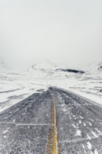 Winter road trip on the Icefields Parkway with lots of snow and ice, Banff National Park, Jasper