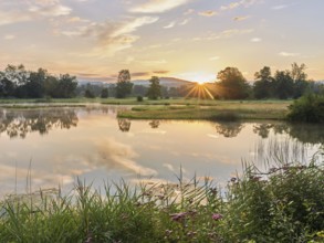 Sunrise at a pond in the Schoren nature reserve, Mühlau, Freiamt, Canton Aargau, Switzerland