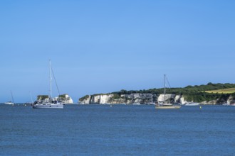 Boats on sea over Knoll Beach Studland, Poole, Dorset, England, United Kingdom