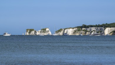 Boats on sea over Knoll Beach Studland, Poole, Dorset, England, United Kingdom