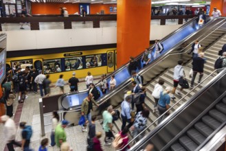 Light rail stop at Stuttgart main station. Platform with many people. Motion blur. Stuttgart,