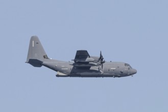 A Lockheed Martin MC-130J Commando II, a US Air Force military aircraft, flies low over Costa Rei,
