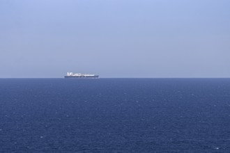An LNG tanker sails along the Mediterranean Sea off the Costa Rei, a coastal section of the Italian