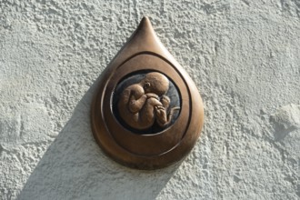 Commemorative picture against abortion on a house in Bratislava, Slovakia