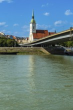 St Martin's Cathedral in Bratislava, in the foreground the Danube and the Bridge of the Slovak