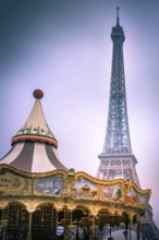 A vintage carousel spins joyfully in a park, with the Eiffel Tower towering majestically in the