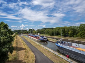 Barges in the Edersheim lock near Hattersheim, Hesse, Germany