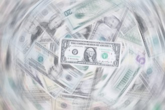 Various US dollar notes in a pile, banknotes