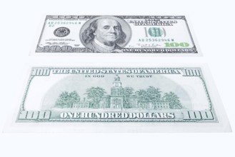 100 US dollar note, 100 dollar banknotes on white background