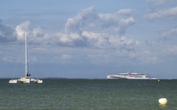 Boats on sea over Knoll Beach Studland, Poole, Dorset, England, United Kingdom