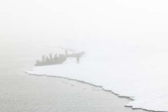 Zodiac with guides lands, Ice Edge, Sea, Spitsbergen, Svalbard