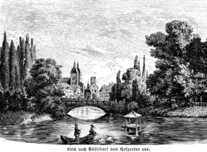 View of Düsseldorf from the Hofgarten park, lake with rowing boat, man, woman, duck house, bridge,