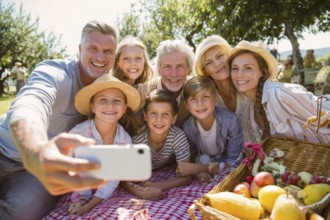 Cheerful happy family taking selfie on picnic on a family vacation day, AI generated