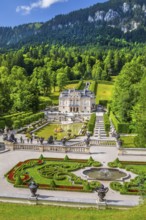 Baroque gardens at the Temple of Venus with a view of the water parterre and Linderhof Palace,