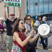 Detroit, Michigan USA - 26 July 2025 - Protesters rally at Eastern Market, banging empty pots to