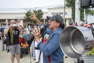 Detroit, Michigan USA - 26 July 2025 - Protesters rally at Eastern Market, banging empty pots to
