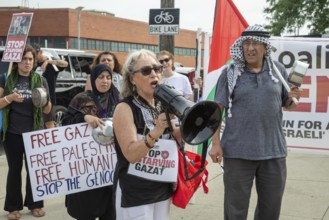 Detroit, Michigan USA - 26 July 2025 - Protesters rally at Eastern Market, banging empty pots to