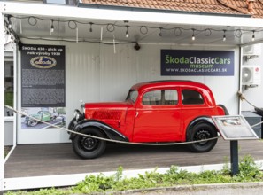 A red Skoda Popular in the Skoda Museum, Capital of Culture 2026, Trencín, Slovakia