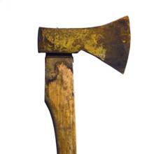 A rusty axel stands prominently against a simple backdrop, showcasing its worn texture and
